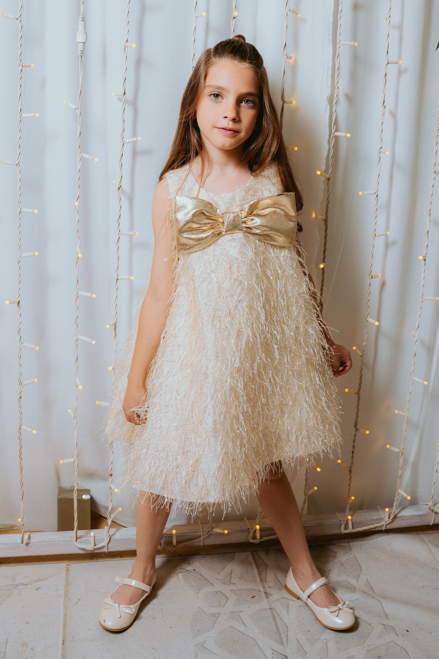 FRINGE GLITTER FABRIC DRESS WITH GOLD BOW